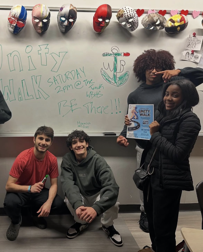 Members of the Interact club posing to promote the Unity Walk